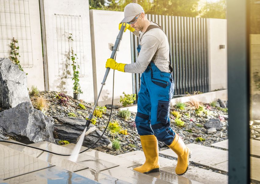 person-with-powerwasher-cleaning-steps