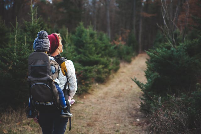 woman and child walking through woodsy path great for family hikes