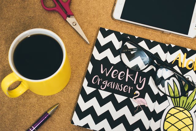 coffee and weekly planner