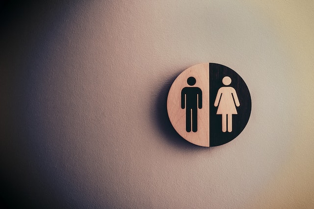 male and female washroom sign